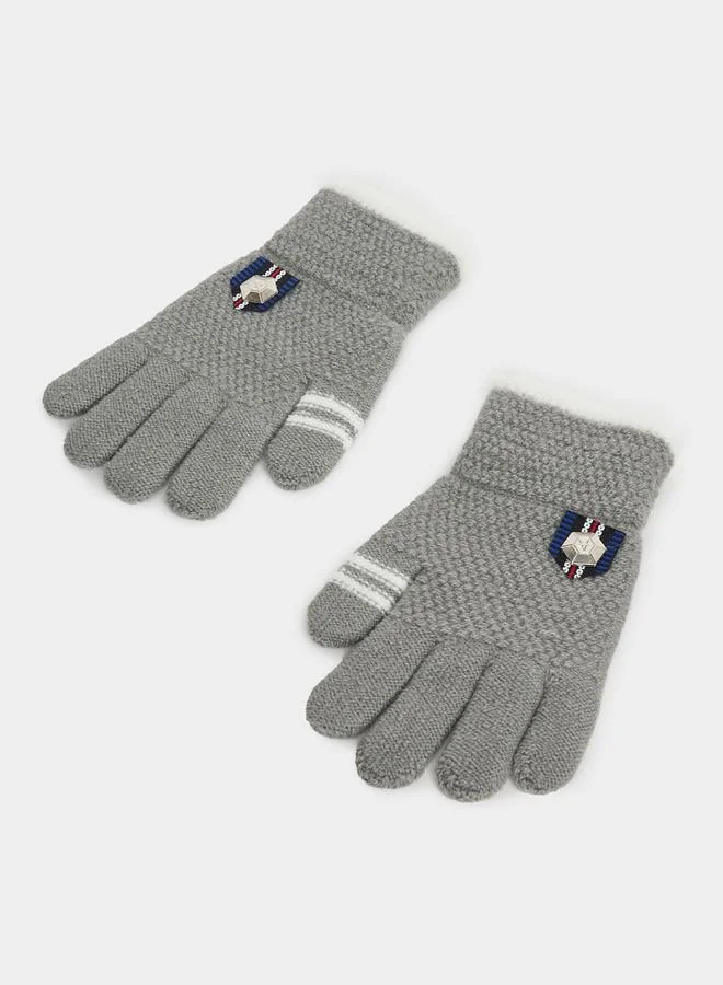 ستايلي قفازات يد محبوكة ومزينة بشارة